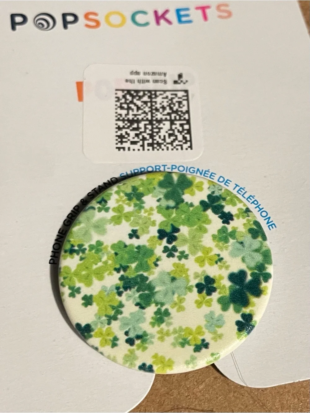 PopSocket shamrocks design PopGrip and three Gold Ring phone grips.